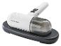 Aspirateur à main blanc avec base de chargement noire.