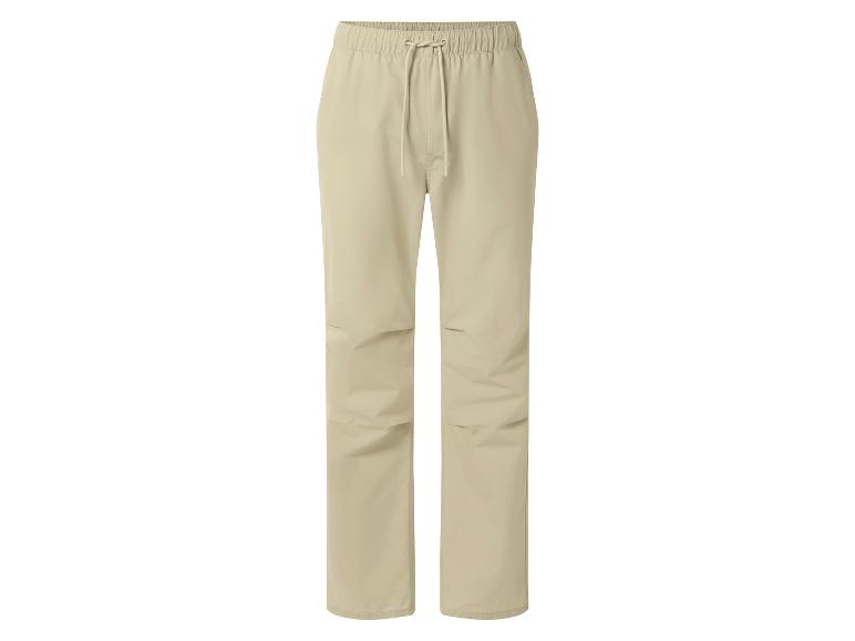 Pantalon décontracté beige pour homme avec taille élastique et cordon de serrage.