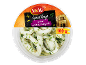 Anneaux de calmar cuits, marinés à l'ail dans un bol transparent, 100 g.