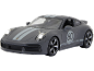 Voiture de sport miniature grise avec phares allumés et le numéro 60.