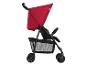 Poussette Hauck rouge avec panier et roues noires.