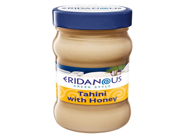 Un pot de tahini au miel à la grecque, avec une étiquette bleue et jaune.