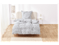 Parure de lit en coton avec motif géométrique gris sur fond blanc.