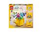Ensemble LEGO Creator 3 en 1 avec pot de fleurs, papillon et oiseaux.