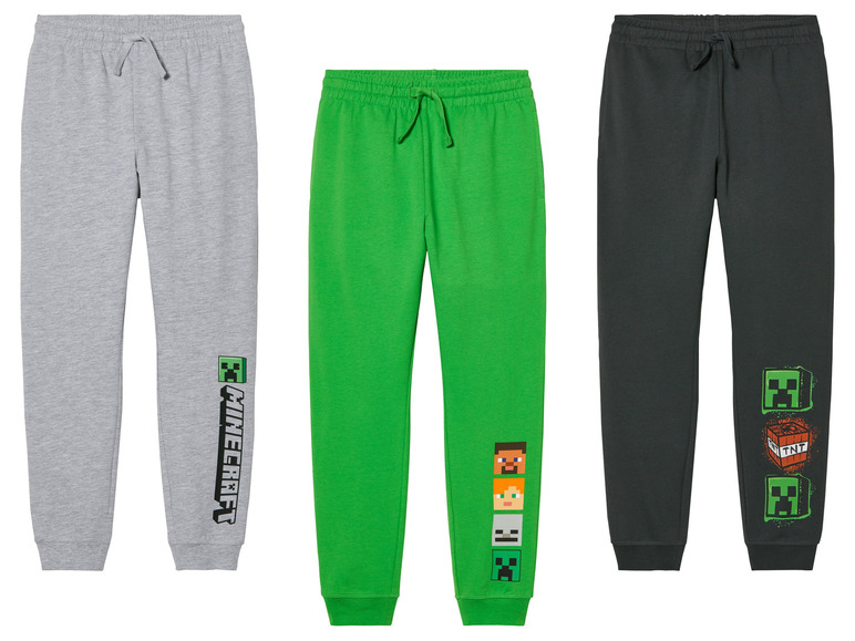 Trois pantalons de survêtement Minecraft en gris, vert et noir.