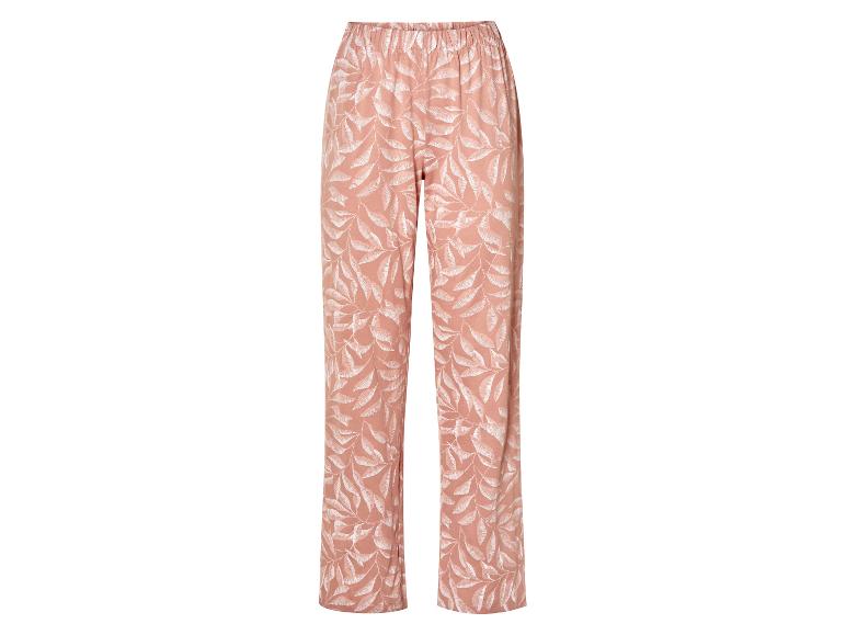 Pantalon de pyjama rose poudré à motif feuilles.