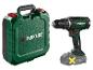 Mallette verte pour outils électriques et une perceuse sans fil avec batterie.