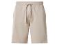 Short de survêtement beige avec cordon de serrage ajustable et petit logo brodé.