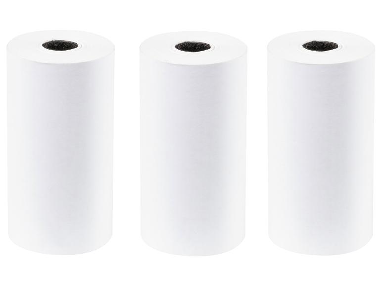 Trois rouleaux de papier thermique blanc pour imprimante.
