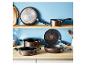Ensemble de cuisson Tefal couleur bronze, comprenant poêles, casseroles et un wok.