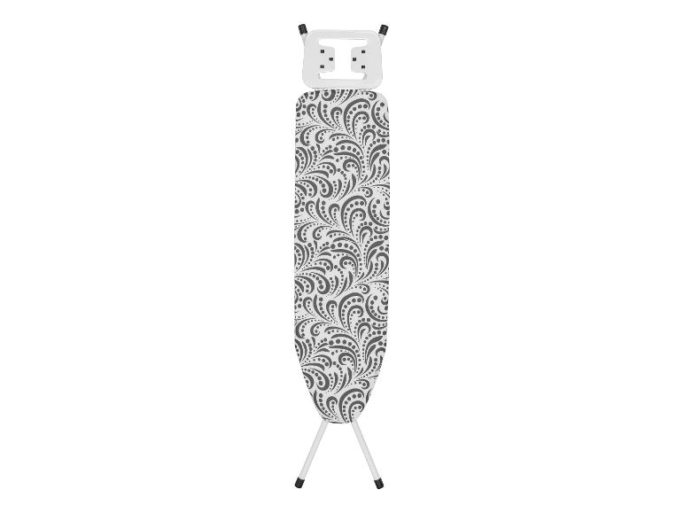 Table à repasser avec une housse à motifs gris et un support blanc.