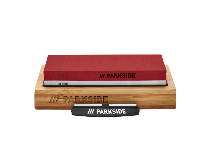 Un aiguiseur Parkside avec deux pierres à aiguiser sur un support en bois.