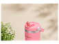Gobelet isotherme rose SilverCrest avec paille pliable.