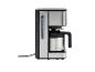 Cafetière moderne en acier inoxydable et noir, avec carafe thermique et indicateur de niveau d'eau.