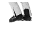 Pantalon de ski et chaussures de ski en noir et blanc