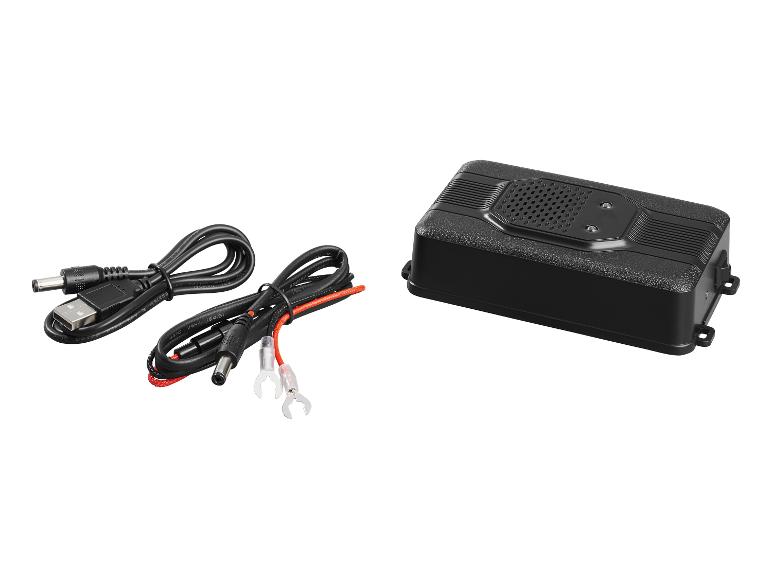 Appareil électronique noir avec grille de haut-parleur et deux câbles d'alimentation