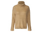 Un pull en laine beige avec un col roulé.