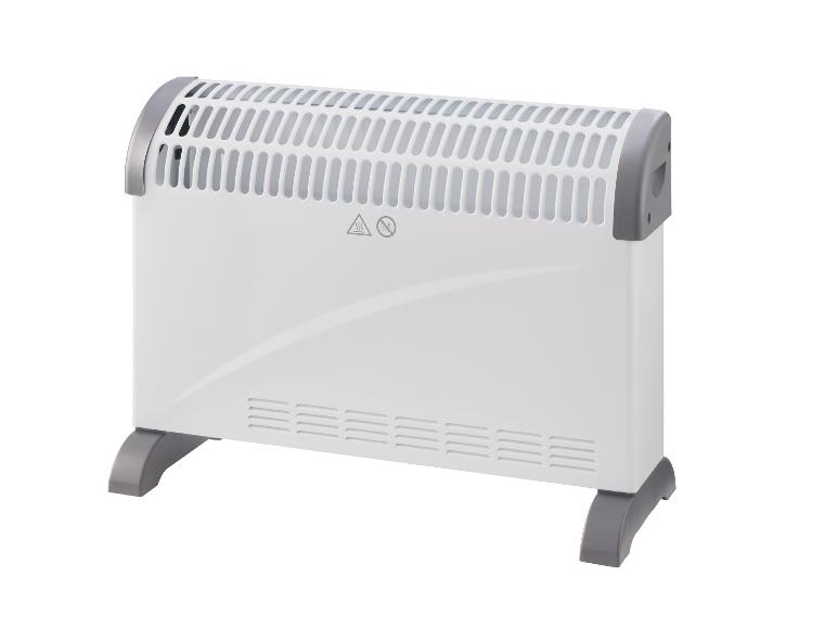 Radiateur électrique blanc avec des grilles d'aération et des symboles d'avertissement.