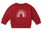 Un sweat-shirt rouge à manches longues pour bébé avec un imprimé arc-en-ciel.