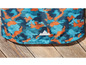 Un short de bain bleu et orange avec un logo de vélo de montagne.