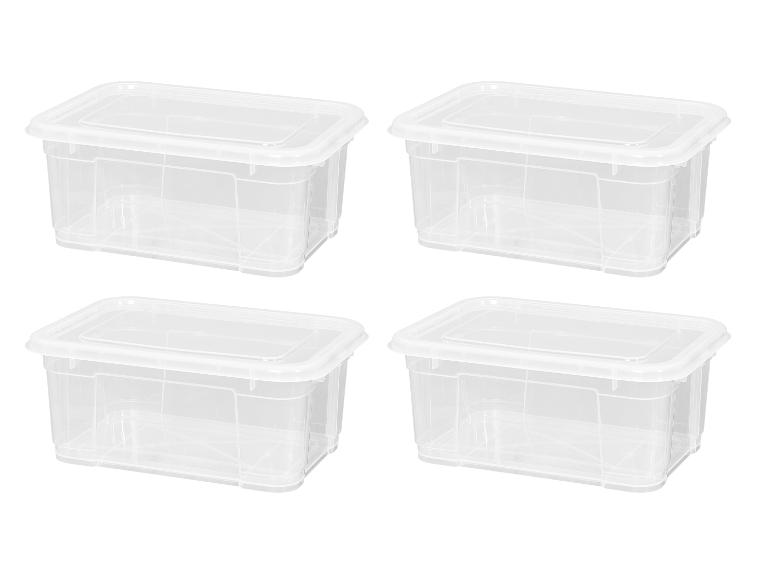 Quatre boîtes de rangement rectangulaires en plastique transparent avec couvercles