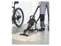Un aspirateur Parkside et un vélo sont présentés ; l’aspirateur ramasse de la sciure de bois.