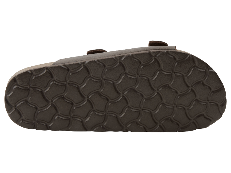 Semelle de tongs en cuir marron avec motif en relief.