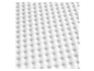 Texture alvéolée d'une mousse blanche.