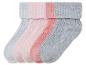 Trois paires de chaussettes en gris, rose et rose clair.