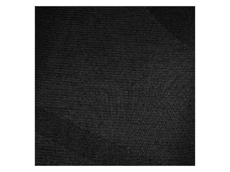 Gros plan sur un tissu noir à texture fine et côtelée.