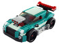 Une voiture LEGO turquoise avec un aileron arrière.