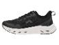 Chaussures de sport pour homme CRIVIT en noir avec semelle blanche.