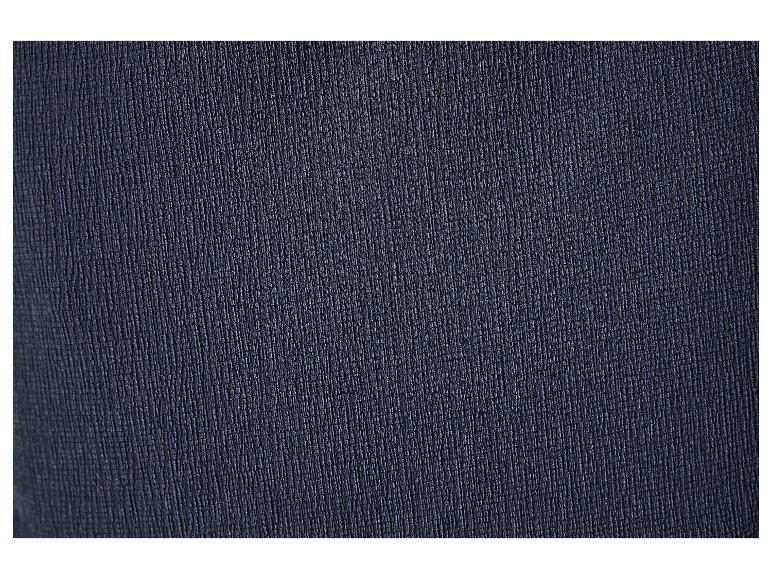 Texture de tissu foncé, détail de surface granuleuse.