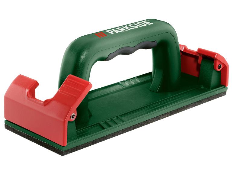 Ponceuse manuelle verte et rouge avec poignée ergonomique.