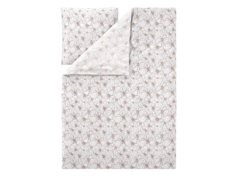 Parure de lit avec taie d'oreiller et housse de couette à motifs de fleurs beiges sur fond blanc.
