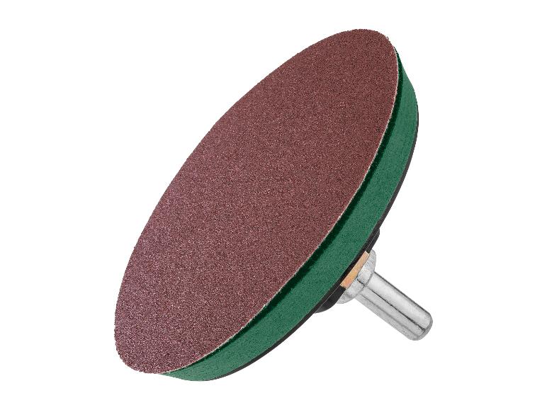 Disque abrasif brun et vert pour ponçage.