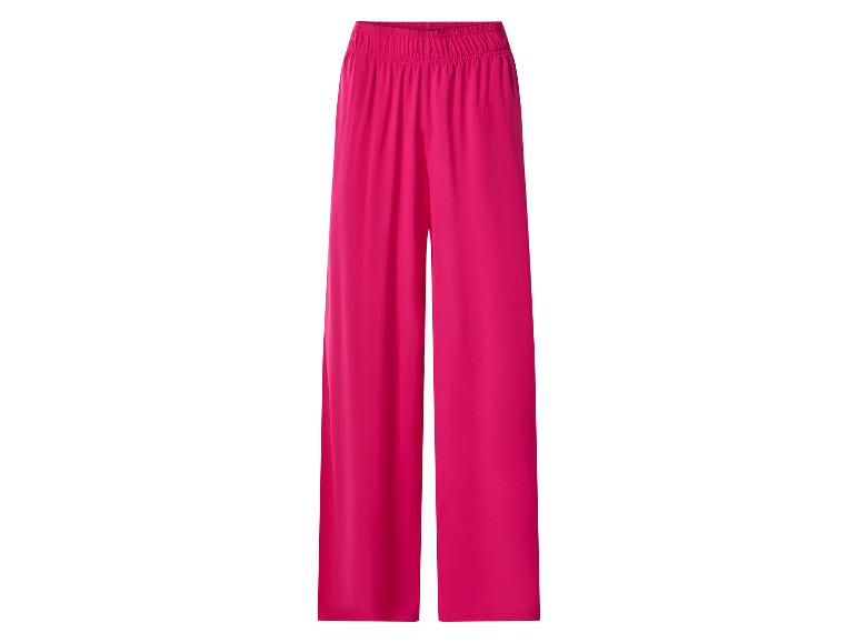 Pantalon large rose avec taille élastiquée.