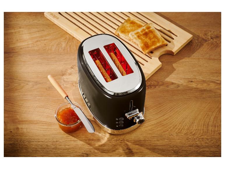 Un grille-pain noir élégant avec deux tranches de pain.