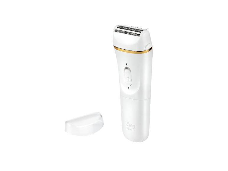 Rasoir féminin rechargeable blanc avec accent doré et capuchon transparent.