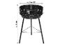 Barbecue noir sur pied avec grille de cuisson.