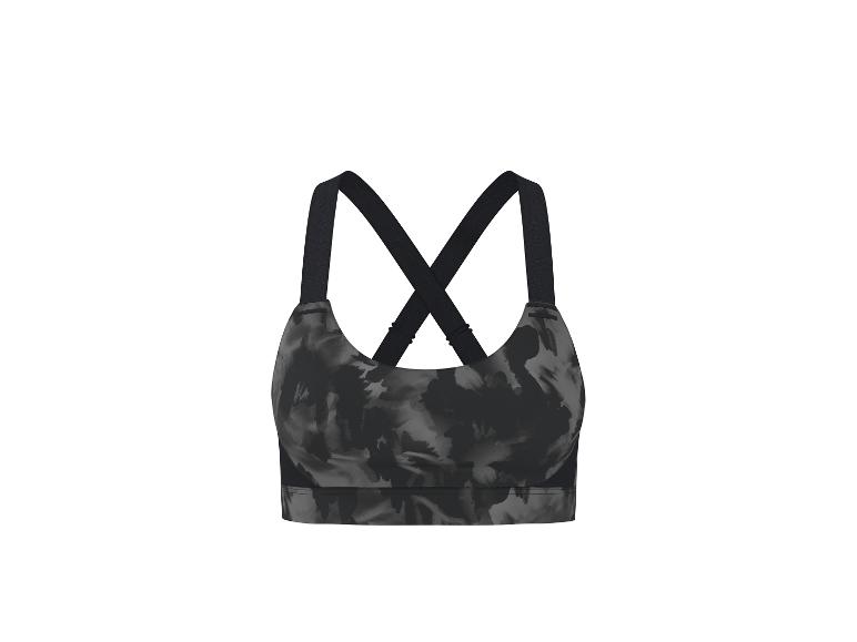 Soutien-gorge de sport noir et gris à motif abstrait avec bretelles croisées.