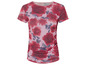 Un t-shirt rose avec un imprimé de roses rouges.
