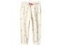 Pantalon de jogging enfant crème à imprimé floral.
