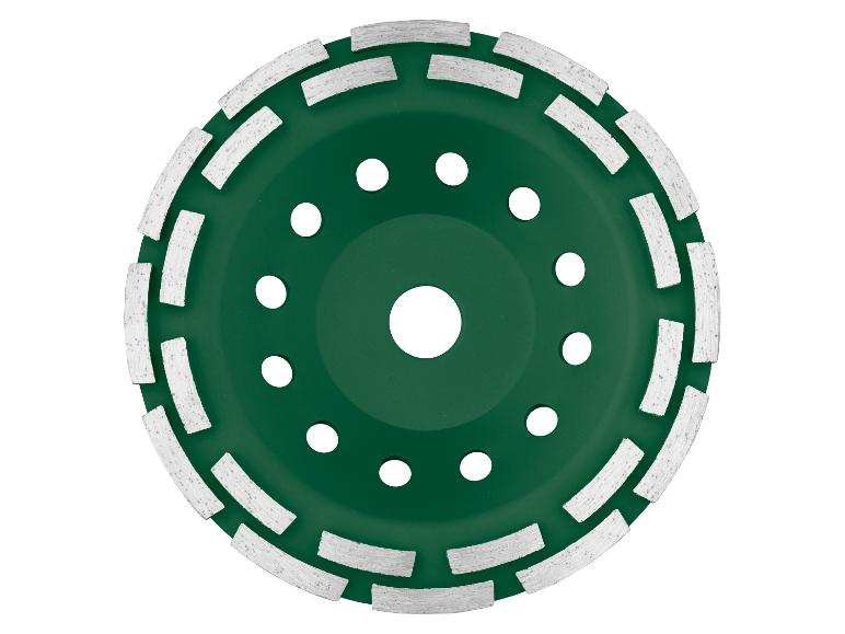 Disque de meulage diamant vert avec bords segmentés et trous de ventilation.