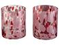 Deux vases cylindriques en verre avec des taches roses et rouges.