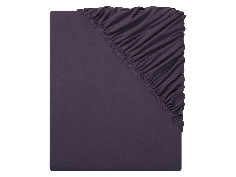 Un drap-housse gris foncé avec élastique.