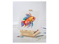 Un chevalet en bois avec une peinture de poisson et une palette de peinture