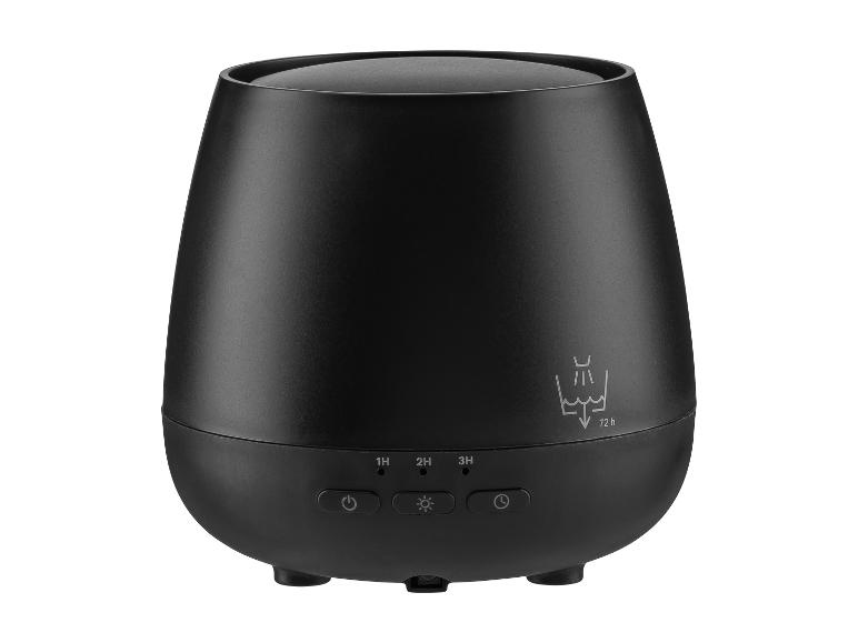Diffuseur d'arômes noir mat avec boutons de commande et icônes pour les réglages de temps et de lumière.