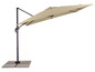Un parasol de jardin beige avec une base en pierre.