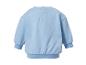 Sweat-shirt bébé bleu clair avec boutons au dos.